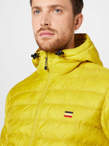 LEVI'S ® Between-Season Jacket 'Presidio Pkbl Hooded Jkt' in Yellow