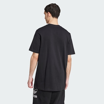ADIDAS ORIGINALS Paita 'Adicolor Outline Trefoil' värissä musta