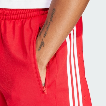 ADIDAS ORIGINALS Normalny krój Spodnie 'Adicolor Classics Adibreak' w kolorze czerwony