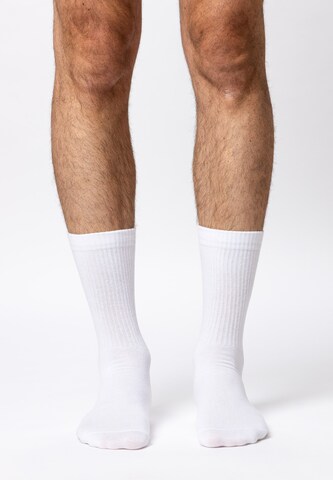 SNOCKS Athletic Socks in Black: front