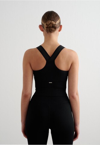 Bustino Reggiseno sportivo di Aim'n in nero