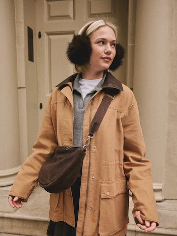 Cache-oreilles Next en marron : devant