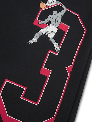 AND1 Loosefit Hose in Schwarz