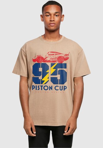 ABSOLUTE CULT Shirt 'Cars - Piston Cup 95' in Beige: voorkant