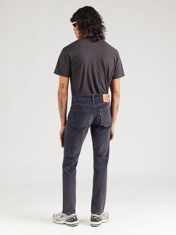 LEVI'S ® Slimfit Jeans '511' in Schwarz