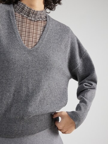 Pull-over Sisley en gris