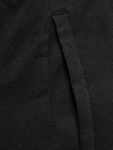 Hummel Regular Sporthose in Schwarz