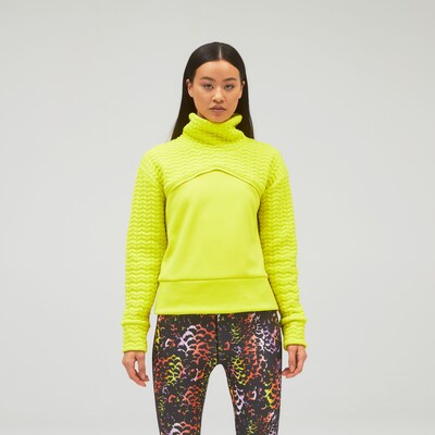 new balance Pull-over de sport 'NB Heatloft Pullover' en jaune, Vue avec produit
