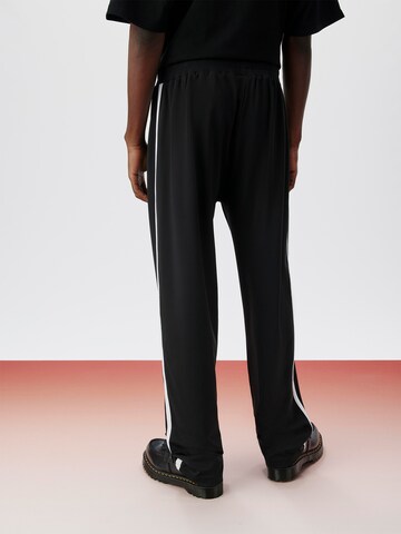 ABOUT YOU x Kingsley Coman Regular Pants 'Kian' in Black