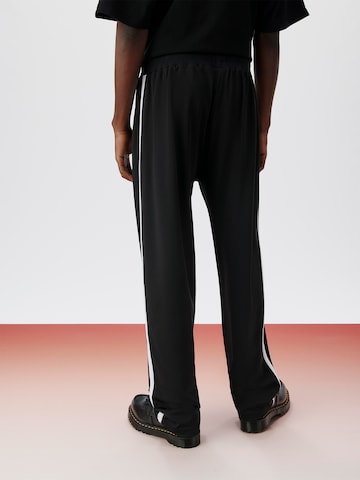 ABOUT YOU x Kingsley Coman Regular Pants 'Kian' in Black