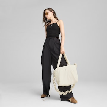 PUMA Top 'Wardrobe Ess' in Zwart