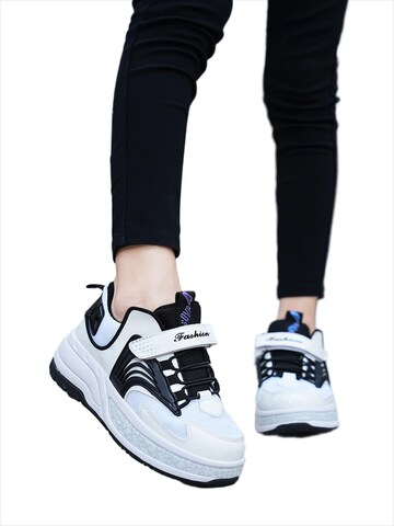 HUSKSWARE Inline and Roller Skates in White