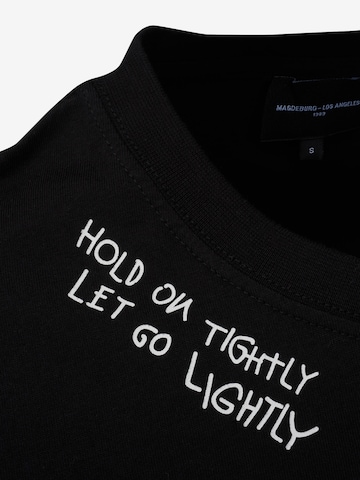 Magdeburg Los Angeles Shirts 'LET GO LIGHTLY' i sort