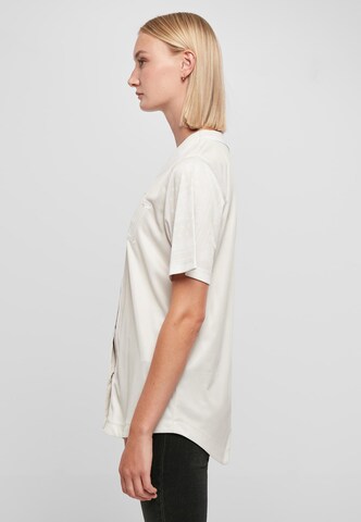 Chemisier Karl Kani en beige