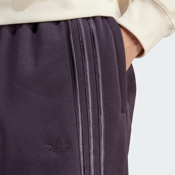 ADIDAS ORIGINALS Tapered Sporthose in Lila