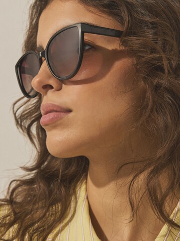 Lunettes de soleil Next en marron