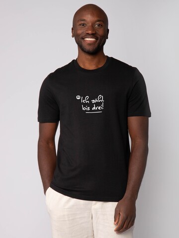 T-Shirt 'Ich Zähl Bis Drei' Watapparel en noir : devant
