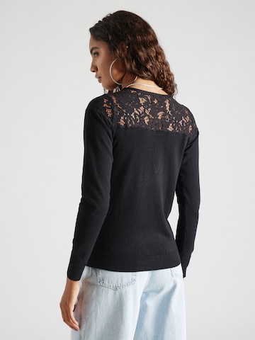 Pullover 'Joy ' di ABOUT YOU in nero