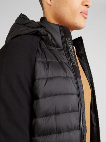 Superdry Prehodna jakna 'Storm Hybrid' | črna barva