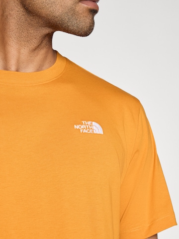 Tricou 'EVOLUTION SIMPLE DOME' de la THE NORTH FACE pe portocaliu