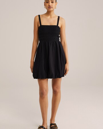 WE Fashion Dress in Black: front