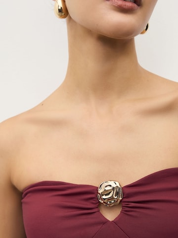 Next - Top en rojo