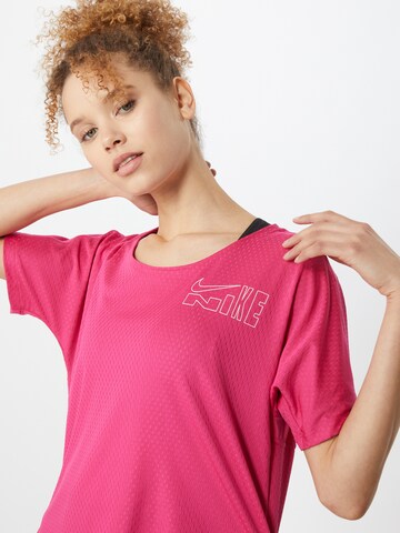 NIKE Sportshirt 'City Sleek' in Pink