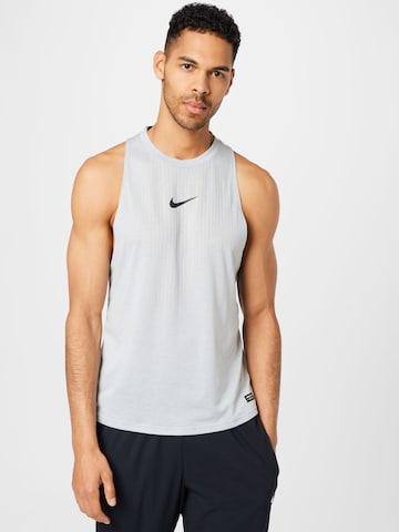 NIKE - Camiseta funcional en gris: frente