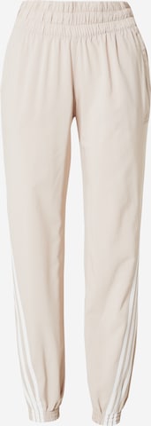 Effilé Pantalon de sport ADIDAS SPORTSWEAR en beige : devant