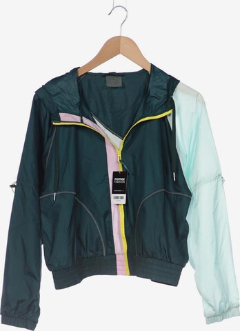 PUMA Jacket & Coat in XL in Green: front