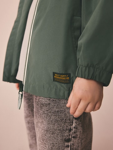 Next Демисезонная куртка в Зеленый