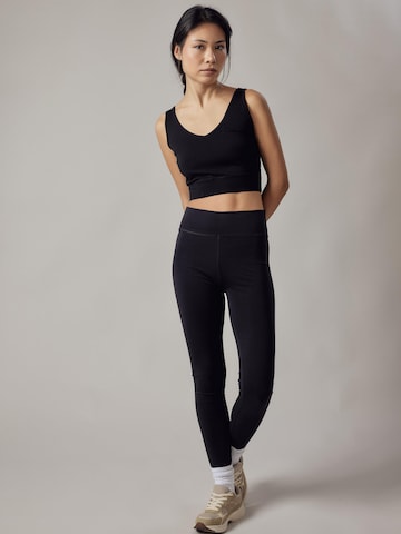 Top di OWN Off With Nature in nero