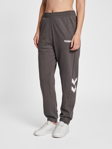 Effilé Pantalon de sport Hummel en noir