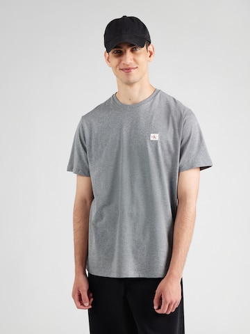 Calvin Klein Jeans Bluser & t-shirts i grå: forside