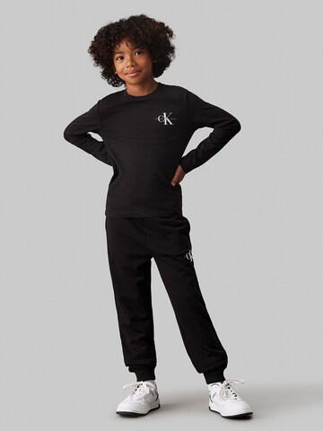 Tapered Pantaloni di Calvin Klein Jeans in nero