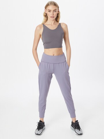 UNDER ARMOUR Tapered Workout Pants 'Meridian' in Purple