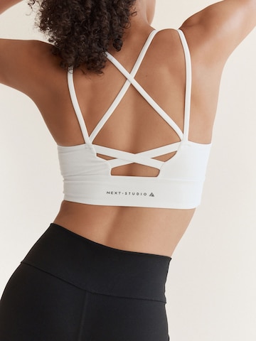 Next Bustier Urheilurintaliivit värissä valkoinen