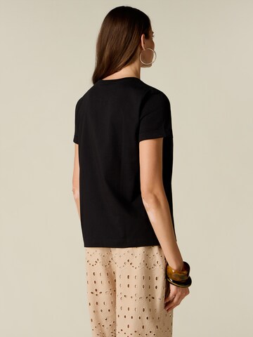 oltre - Camiseta en negro