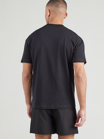 Tricou funcțional de la new balance pe negru