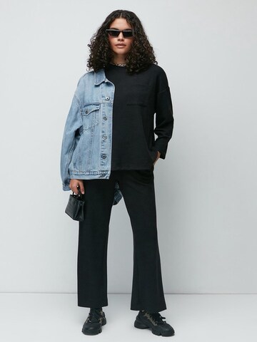 C&City Sweatsuit in Black: front