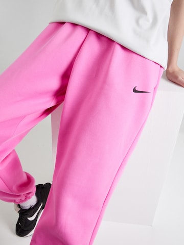 Nike Sportswear Tapered Παντελόνι 'PHOENIX FLEECE' σε ροζ