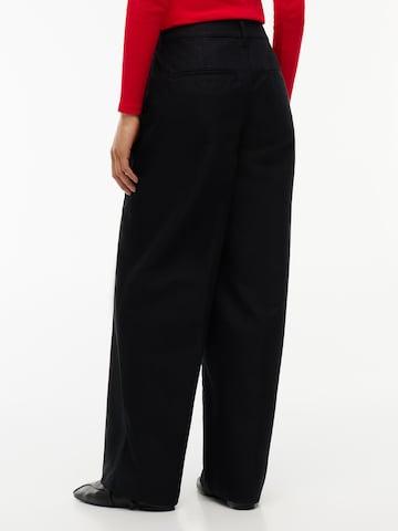 Tommy Jeans Wide leg Pressveckad byxa i svart