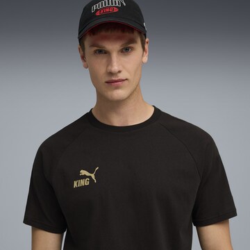 PUMA Functioneel shirt 'King' in Zwart