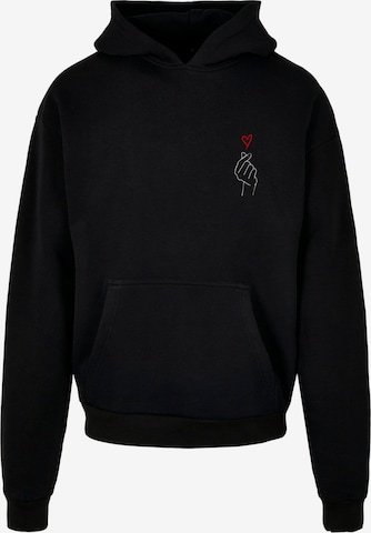 Merchcode Sweatshirt 'K Heart' in Zwart: voorkant