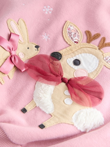 Set Next en rose