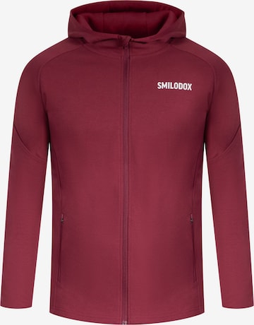 Veste de survêtement 'Maison' Smilodox en rouge : devant