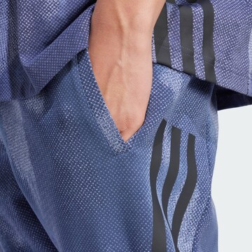 ADIDAS SPORTSWEAR Tapered Sports trousers 'Future Icons' in Blue