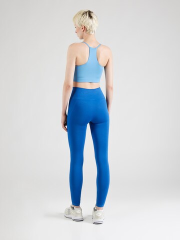 Hummel Skinny Sportovní kalhoty 'Tif' – modrá