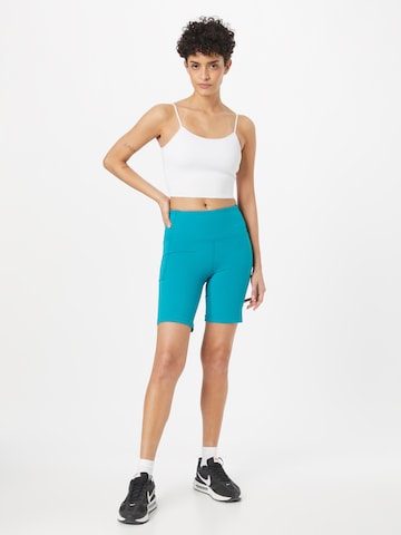 UNDER ARMOUR Slimfit Sportbroek 'Meridian' in Groen