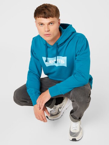 LEVI'S ® Sweatshirt 'Standard Graphic Hoodie' in Blauw